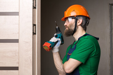 door; setup; repair; installation; worker; man; locksmith; industrial; drilling; service; concept; installing; uniform; working; repairing; architect; inside; house; interior; technology; mechanic; pr