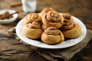 Homemade cinnamon rolls on a white plate
