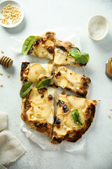 Homemade pizza with pear and blue cheese