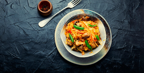 Tasty cabbage stewed with mushrooms.