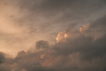Panorama of the summer sky in the evening. Clouds with some sunlight.