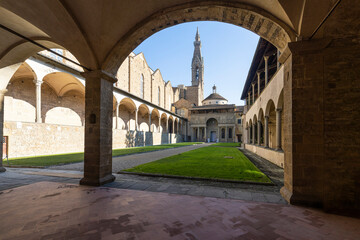Large cloister in the Santa Croce church in Florence, Italy