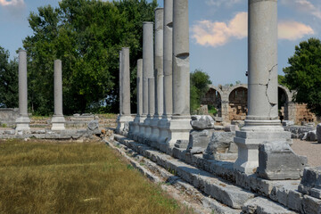 Ancient city of Perge near Antalya Turkey. Columned street and ruins.. Believed to have been built in the 12th to 13th centuries BC. Blue Sky.