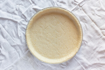 Pie blank - shortbread dough before baking in a round shape