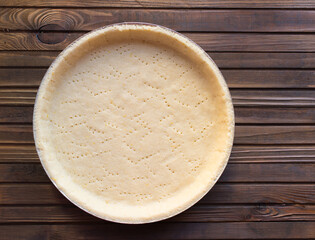 Pie blank - shortbread dough before baking in a round shape