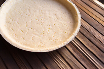 Pie blank - shortbread dough before baking in a round shape