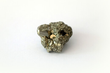 Macro shooting of raw peruvian pyrite or fools gold stone isolated on white background. raw gem stone. 