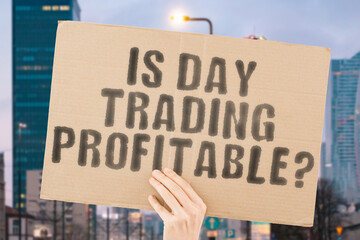 The question " Is day trading profitable? " on a banner in men's hand with blurred background. Bullish. Prices. Rates. Forex. Recovery. Money. Research. Risk. Increase. Buy. Changing