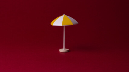 miniature colorful beach umbrella, isolated