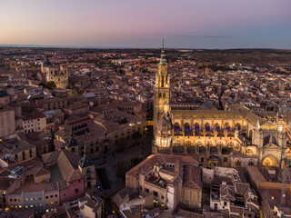 Aerial view of the sunset over the stunning cathedral of Toledo medieval old town in Spain