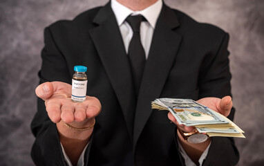 a stylish older man in a suit carries the vaccine in a jar and dollars for it.