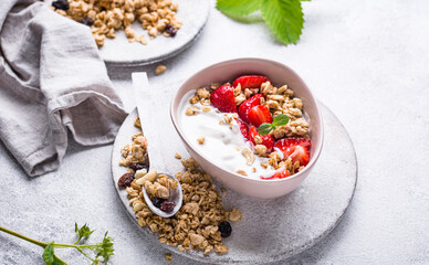 Obraz na płótnie Canvas Granola with Greek yogurt and strawberry