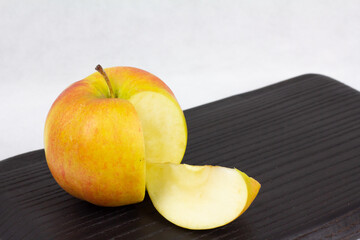 sliced apple on wooden table