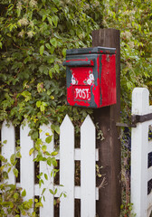 Flaking Red Painted Postbox