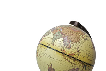 Asia and Oceania region on the vintage globe. Close-up view, fragment of political globe map. Isolated on a white background. Education or political geography concept
