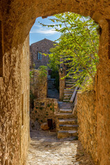 View of traditional architecture and yellow stone's arch  from  the medieval  castle of Monemvasia, Lakonia, Peloponnese.