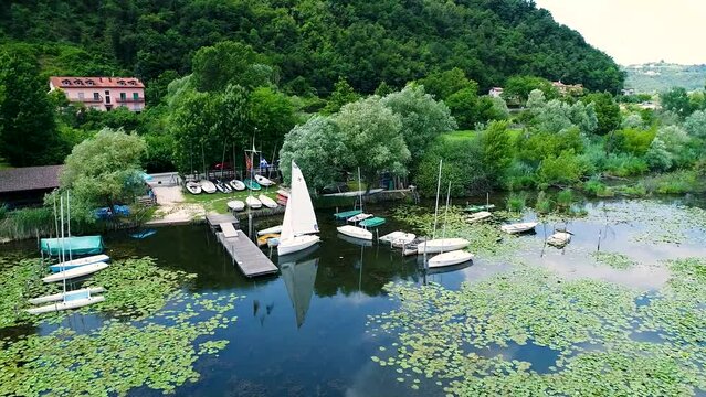 Aerial shot of lake of Fimon with boats. Arcugnano, Vicenza, Vento, Italy