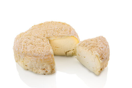 Robiola delle Langhe, a typical toma cheese made of sheep, goat and cow milk from Piedmont, Italy. Isolated on white