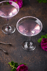 Pink martini cocktail with rose syrup