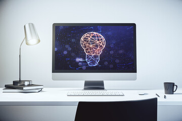 Modern computer monitor with creative light bulb hologram, research and development concept. 3D Rendering