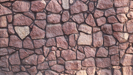 Fence masonry. Rubble stone. Texture