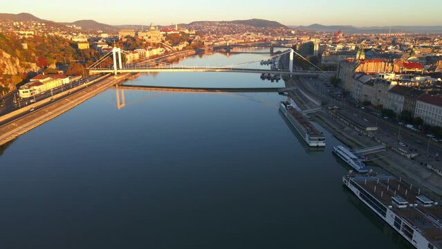 The Elisabeth Bridge is reflected in the River Danube in Budapest