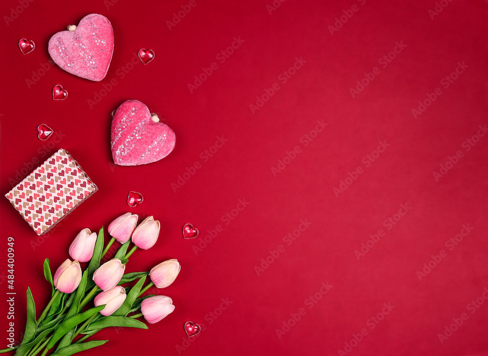 Sticker romantic floral background with tulips flowers, gift and hearts on red background.