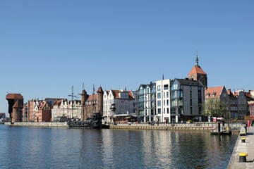 Panorama of Old Town in Gdansk and Motlawa river with ships.