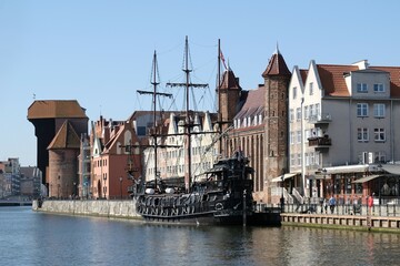 Panorama of Old Town in Gdansk and Motlawa river with ships.