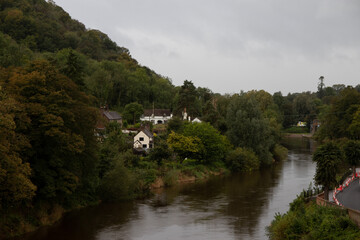 Fototapeta na wymiar Houses on the banks of the River Severn at Ironbridge, Shropshire