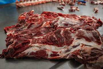 frigorífico de carne   vacuna  de argentina  faenando un novillo . meat argentine  and  salame 