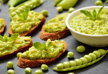 Sandwiches with green pea puree and pine nuts