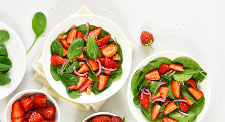 Tasty fruit salad with strawberry and spinach