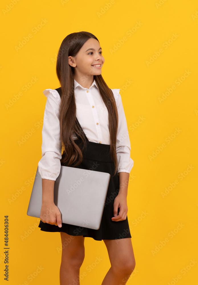 Wall mural happy child in school uniform hold computer, education