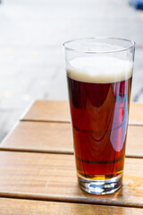 Glass of beer on table