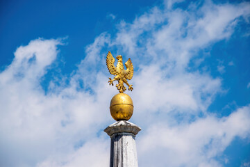 Golden Eagle - Symbol of Kranj, Slovenia on the top of column in Main Square