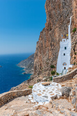 The famous Hozoviotissa Monastery standing on a rock over the Aegean sea in Amorgos island,...