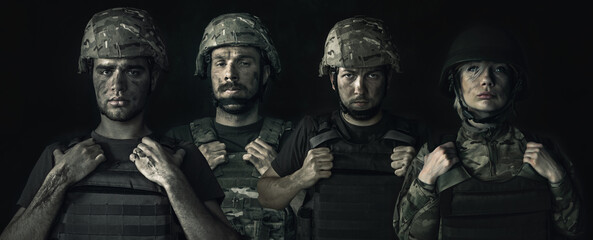 Conceptual collage with young male and female soldiers isolated on dark background. Men and woman...
