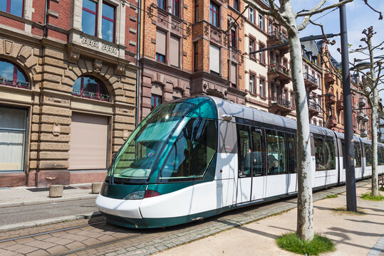 Modern tram (model Alstom Citadis 403) on a street of Strasbourg, Alsace region, France. Current tramway network has 6 lines with a total route length of 40.7 km