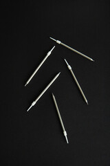 hammer and nails on black