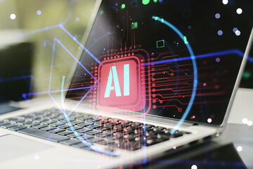 Double exposure of creative artificial Intelligence abbreviation with computer on background....