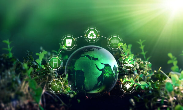 Sources for renewable, sustainable development. Environment,ecology and energy saving concept.Energy resources icons on crystal earth on sunny background.