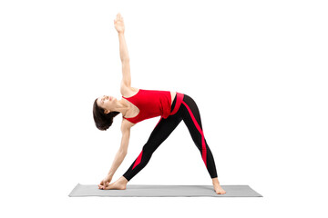 Yoga, triangle pose. Attractive fit woman in red sportswear with haircut practice Utthita Trikonasana drill, isolated on white.