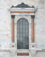 Large arched church window with ornament