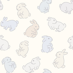Vector seamless pattern with cute multicolored rabbits on a light yellow background
