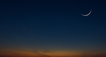 Islamic moon sky on dark blue dusk twilight sky in the evening with sunset and beautiful sunlight...