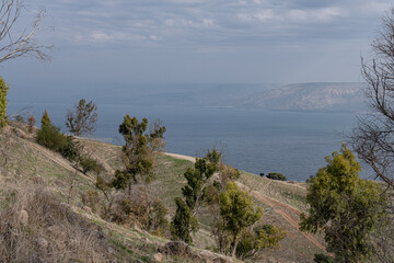 Fototapeta na wymiar View of the Sea of Galilee, its eastern coast, and the Golan Heights as seen from Potiya Youth Hostel, located high above the lake, Eastern Galilee, Israel. 