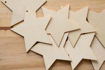 wooden star ornaments or shapes on wood