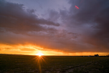 Naklejka na ściany i meble Sunset on the Wyoming Plains