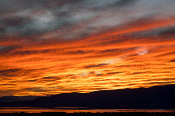 Naklejka na ściany i meble Fire in the sky during sunset in Utah